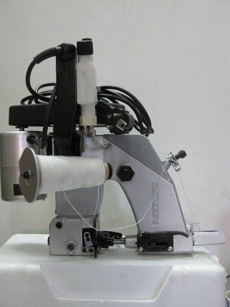 Portable sealing machine elect - Sewing Machine In Textile ulasan dan harga